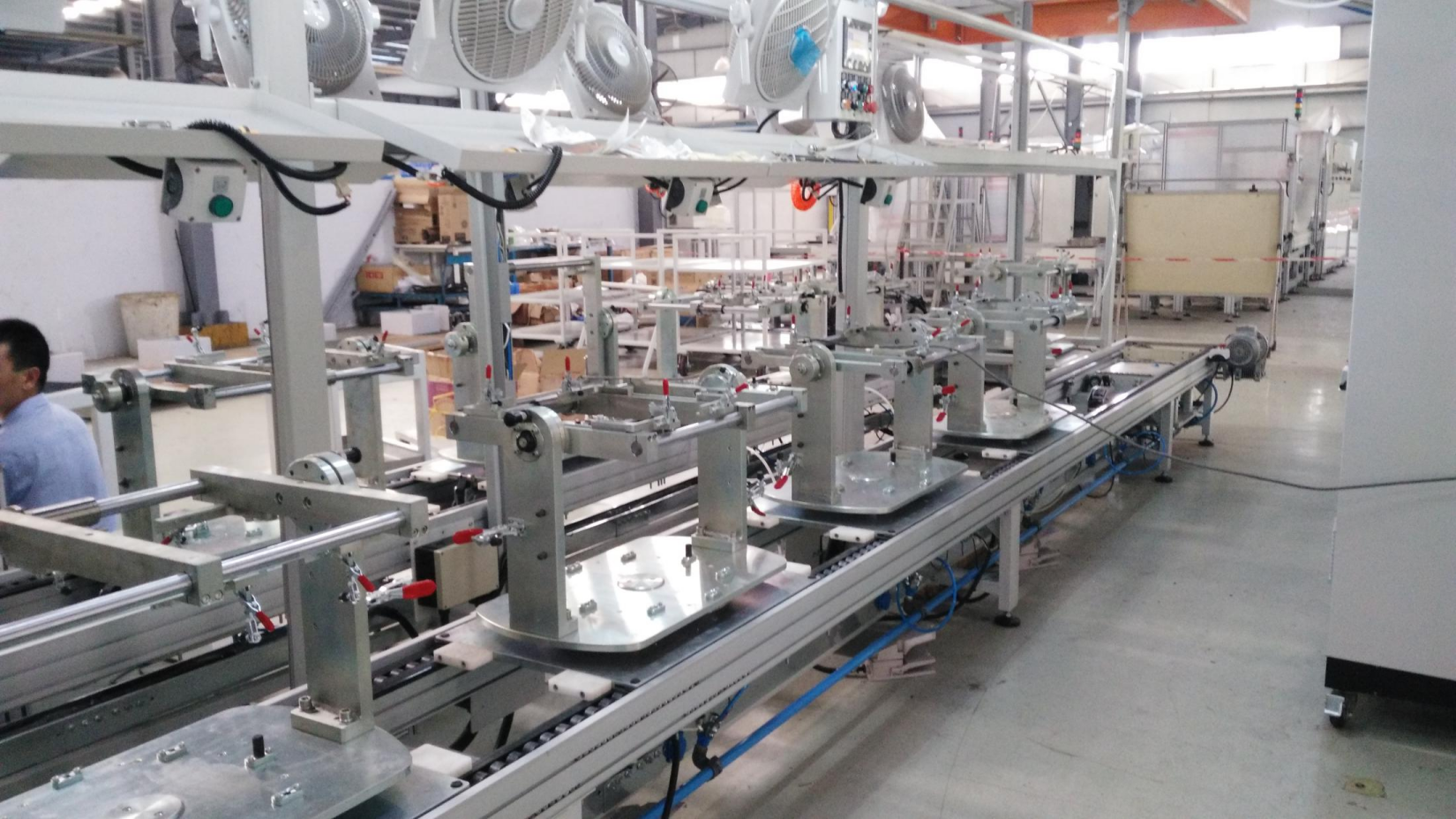 Pedal, variable speed joystick assembly line